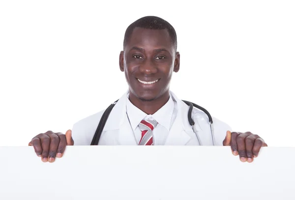 Male Doctor Holding Clipboard — Stock Photo, Image
