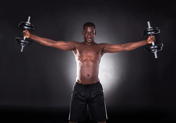 Young African Man Working Out With Dumbbells — Stock Photo, Image