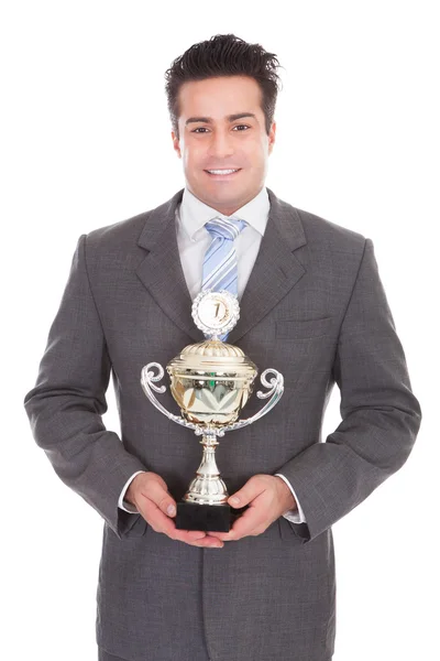 Businessman Holding Trophy — Stock Photo, Image