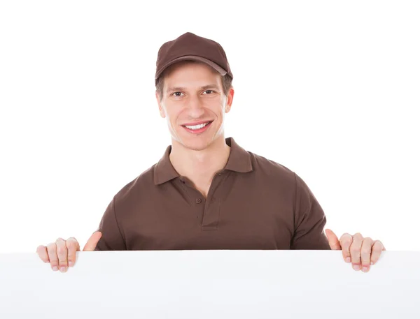 Homem de entrega segurando banner — Fotografia de Stock