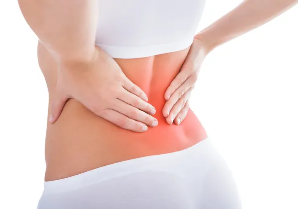 Frau leidet unter Rückenschmerzen — Stockfoto
