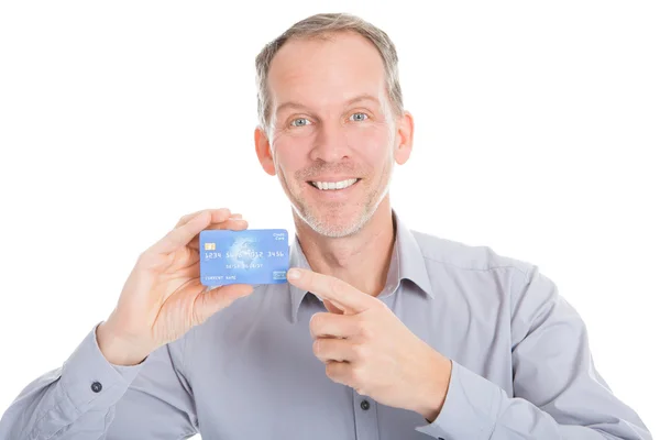 Mature Businessman Showing Credit Card — Stock Photo, Image