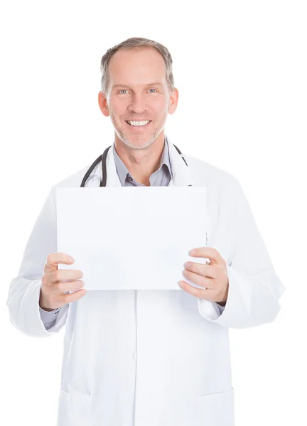 Doctor Pointing On Placard — Stock Photo, Image