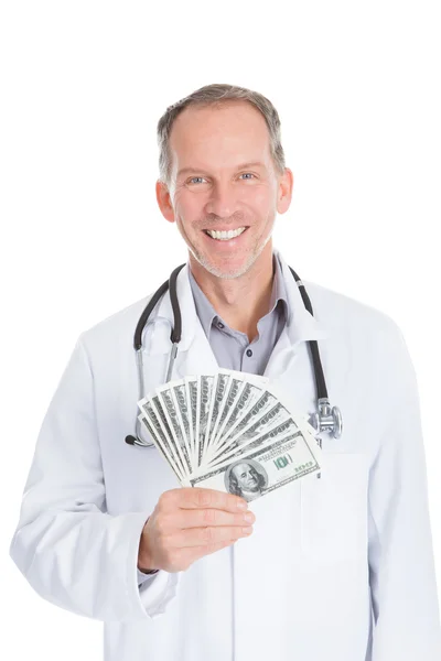 Доктор холдингу гроші — стокове фото