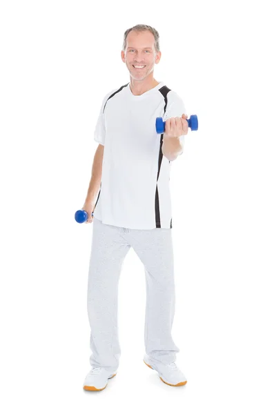 Mature Man Exercising With Dumbbells — Stock Photo, Image