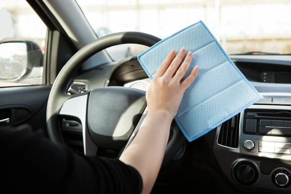 Person Cleaning Steering Wheel In Car — Stock Photo, Image