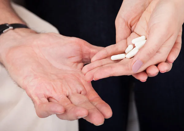 Hand Holding White Pills — Stock Photo, Image