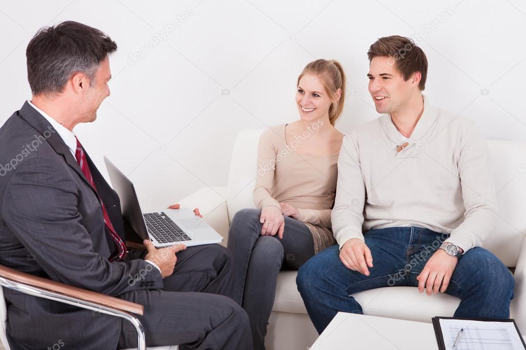 Consultant Advising Young Couple
