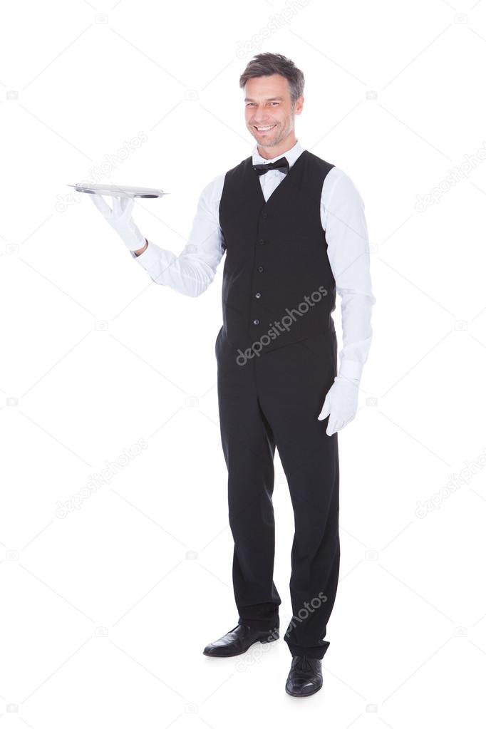 Portrait Of Happy Male Waiter