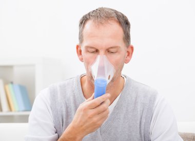 Man Doing Inhalation clipart