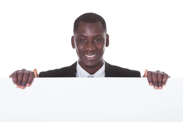 Empresário Africano Holding Placard — Fotografia de Stock