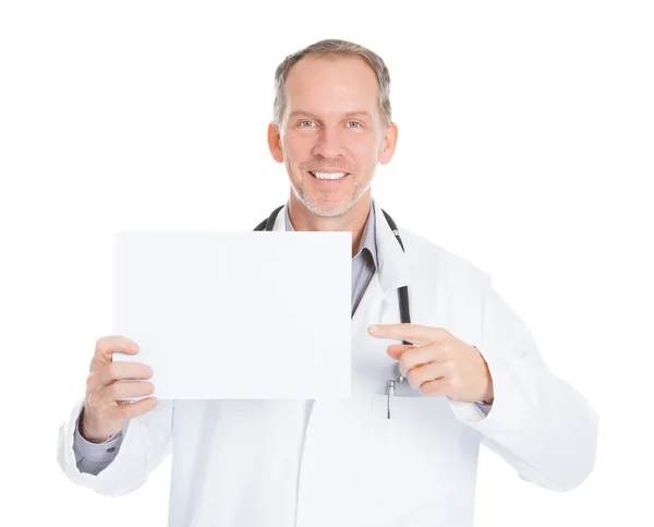 Doctor Pointing On Placard — Stock Photo, Image