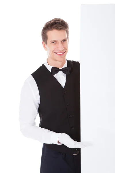 Male Waiter Holding Billboard — Stock Photo, Image