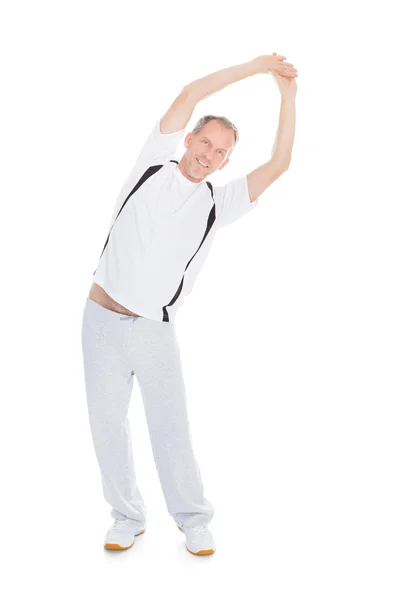 Mature Man Stretching His Arms — Stock Photo, Image