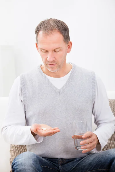 Portrait Of Man Taking Pills — Stock Photo, Image