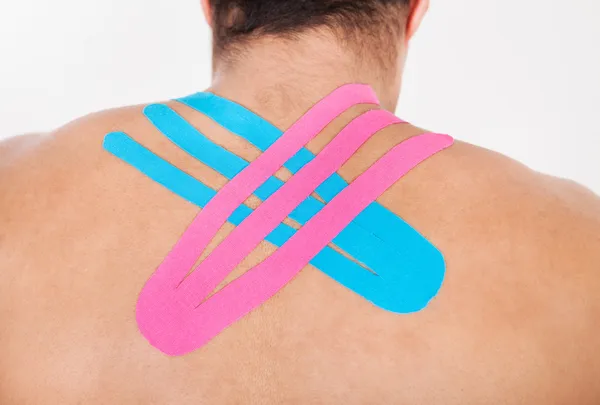 Young Man with Physio Tape Applied On Back — Stok Foto