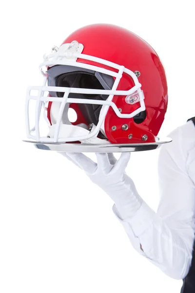 Garçom transportando capacete de futebol americano — Fotografia de Stock