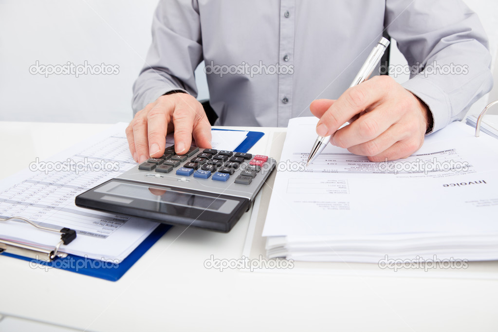 Man Calculating Bills