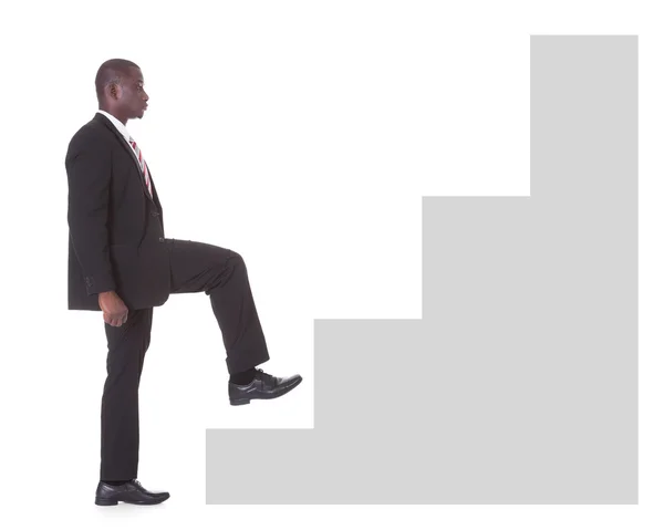 Businessman Climbing Steps — Stock Photo, Image