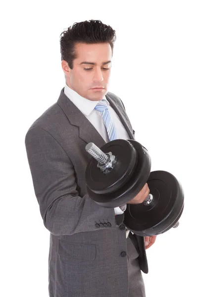 Businessman Lifting Dumbbells — Stock Photo, Image