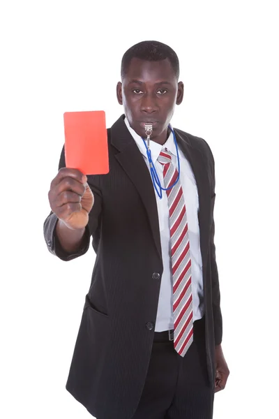 Uomo d'affari con cartellino rosso — Foto Stock