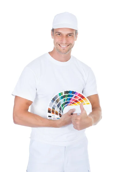 Male Painter With Swatch Book Royalty Free Stock Images