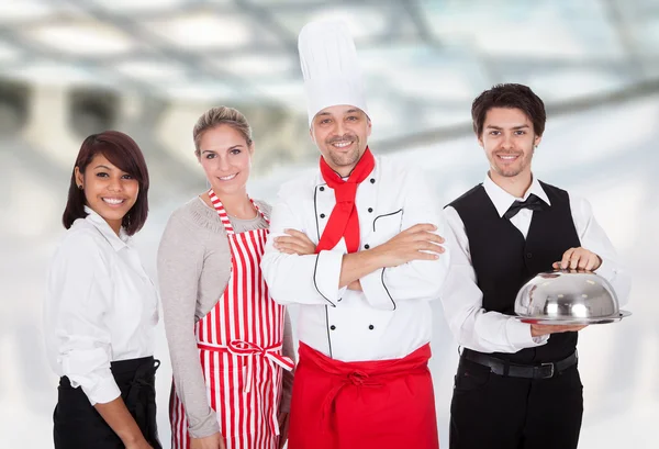 Chef and waiters — Stock Photo, Image