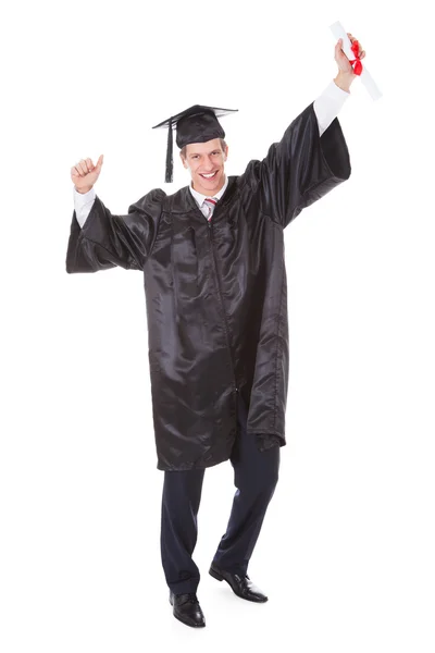 Podekscytowany mężczyzna absolwent — Zdjęcie stockowe
