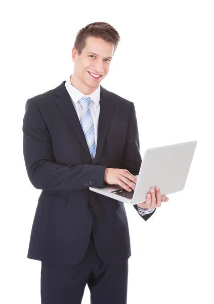 Businessman Holding Laptop — Stock Photo, Image