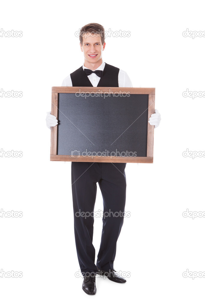 Male Waiter Holding Chalkboard