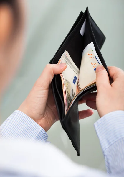 Businessperson With Open Wallet — Stock Photo, Image