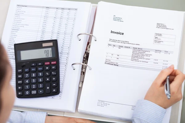 Businessperson With Document And Calculator — Stock Photo, Image