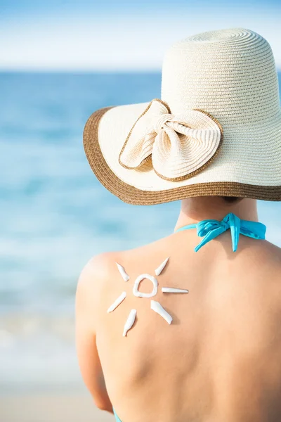 Woman With Sun Drawn From Sunscreen On Back — Stock Photo, Image