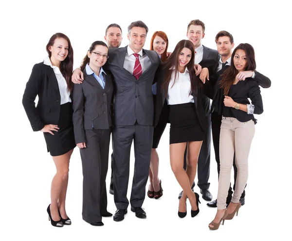 Senior business manager standing on front of his team — Stock Photo, Image