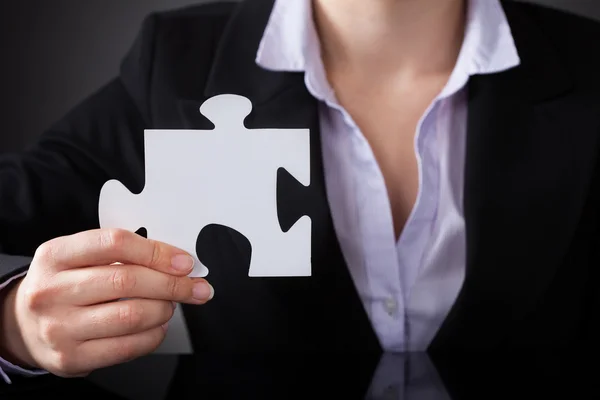 Businessperson With Puzzle — Stock Photo, Image