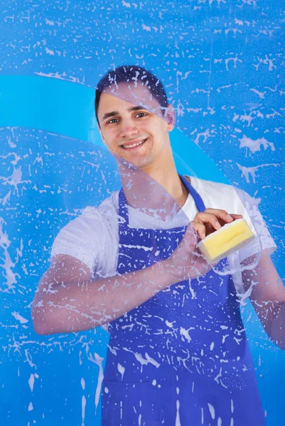 Male Servant Cleaning Glass With Sponge — Stock Photo, Image