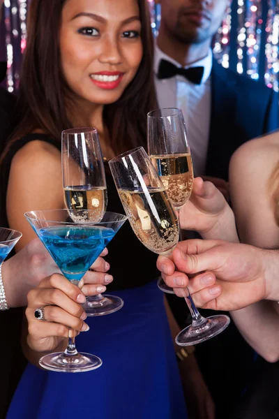 Friends Toasting Drinks At Nightclub — Stock Photo, Image