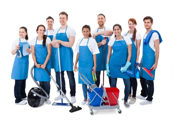 Grote diverse groep van conciërges met apparatuur — Stockfoto