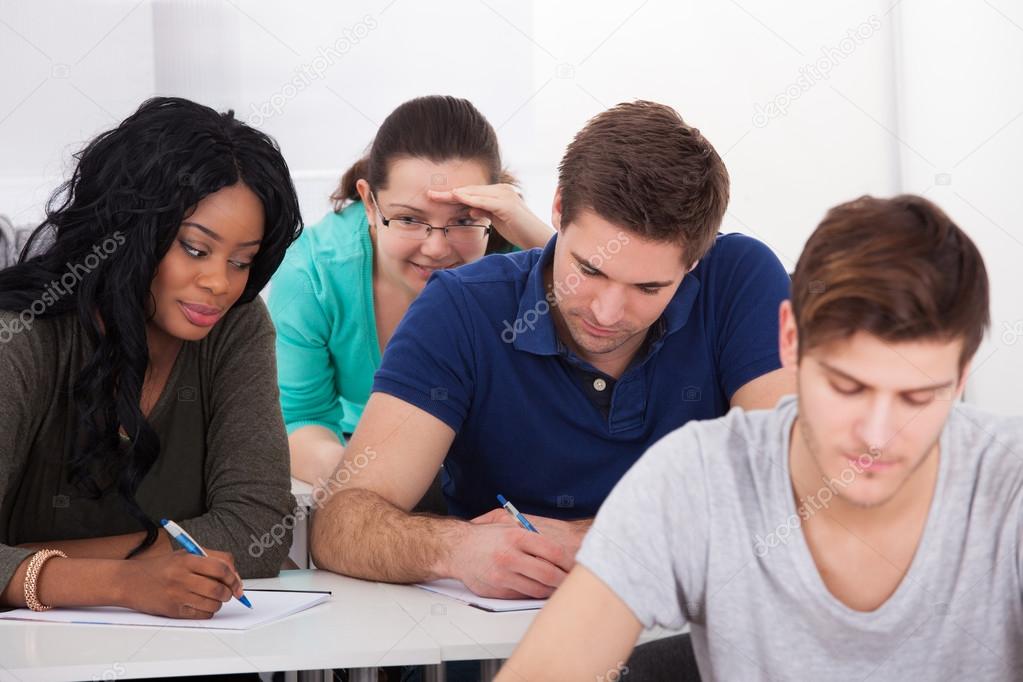 Female Students Trying To Cheat During Test