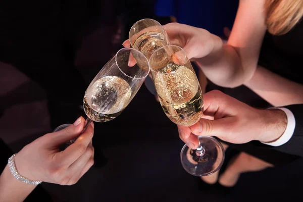 Friends Toasting Champagne At Nightclub — Stock Photo, Image