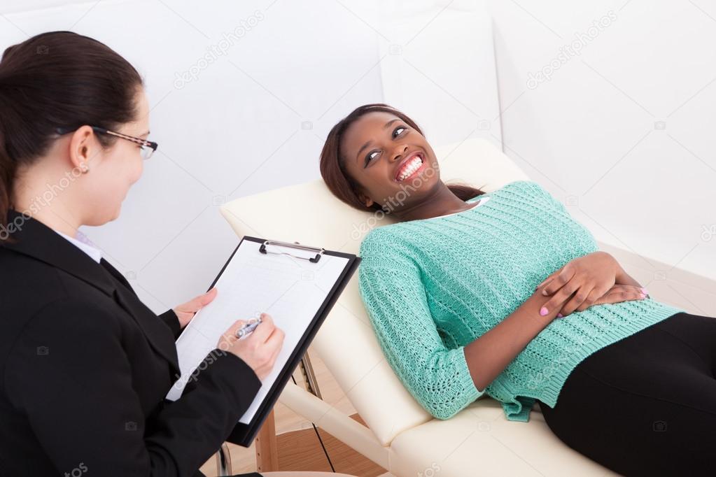 Happy Patient Talking To Psychologist