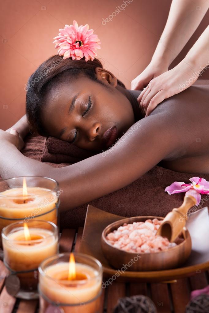 Woman Receiving Shoulder Massage At Spa — Stock Photo © AndreyPopov