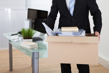 Businessman moving offices clipart
