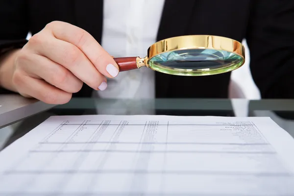 Businesswoman Holding Magnifying Glass — Stock Photo, Image