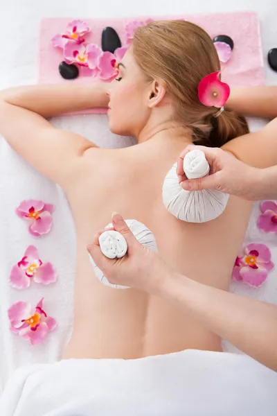 Woman Getting Herbal Compress Ball Therapy — Stock Photo, Image