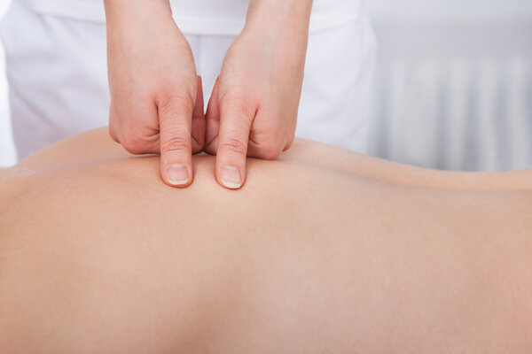 Woman Getting Massage Treatment