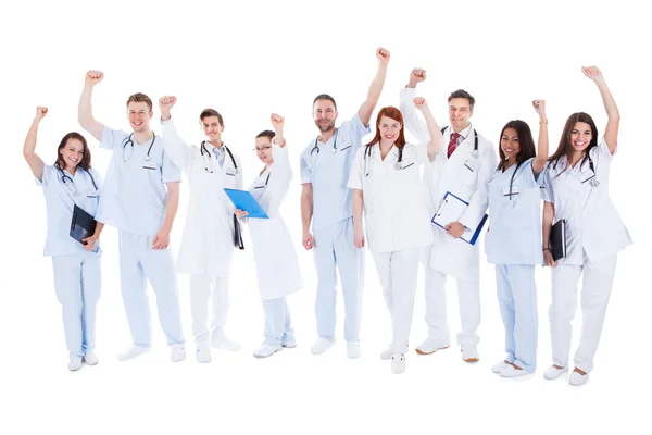 Successful medical team standing cheering — Stock Photo, Image