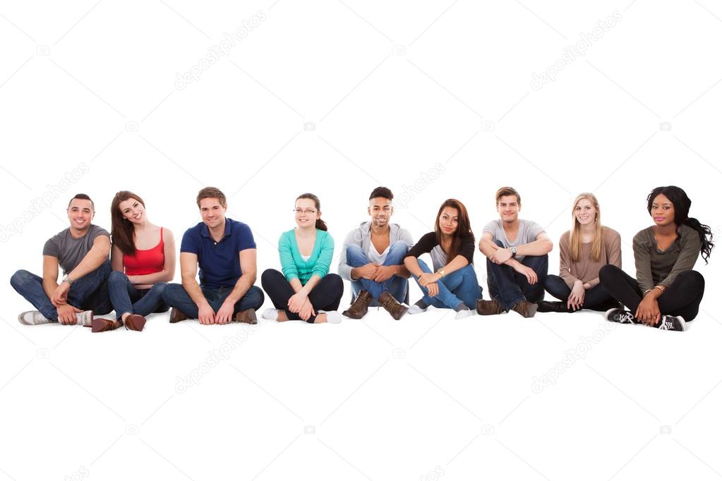 Multiethnic College Students Sitting In A Row