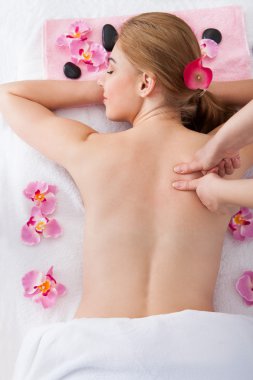 Woman Getting Massage Treatment clipart