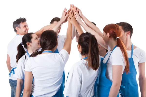 Grupo de limpiadores haciendo alta cinco gesto —  Fotos de Stock